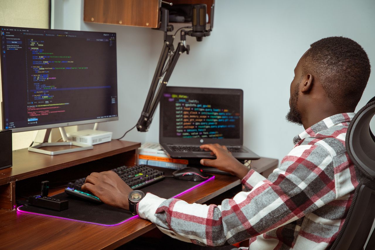 Computer displaying code during digital solution development