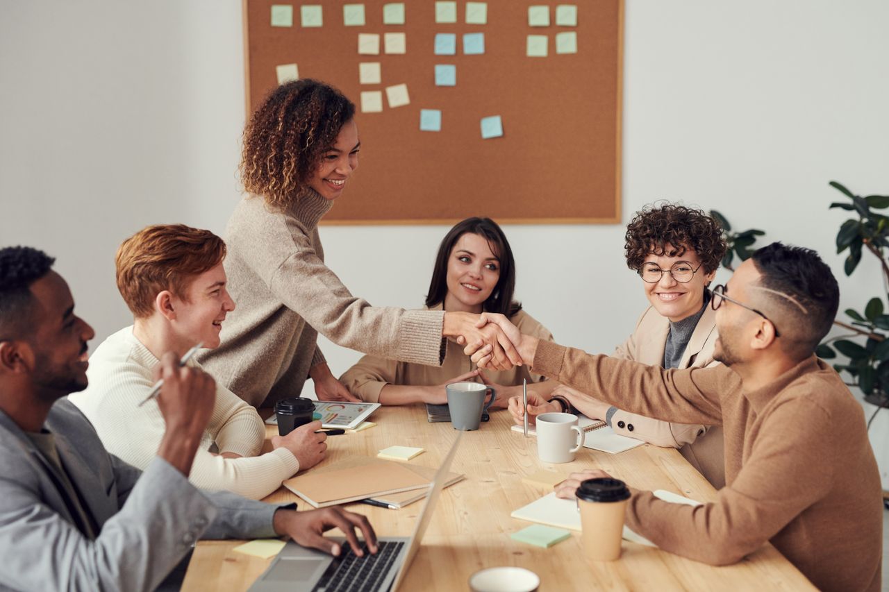 The Oweru team collaborating around a table